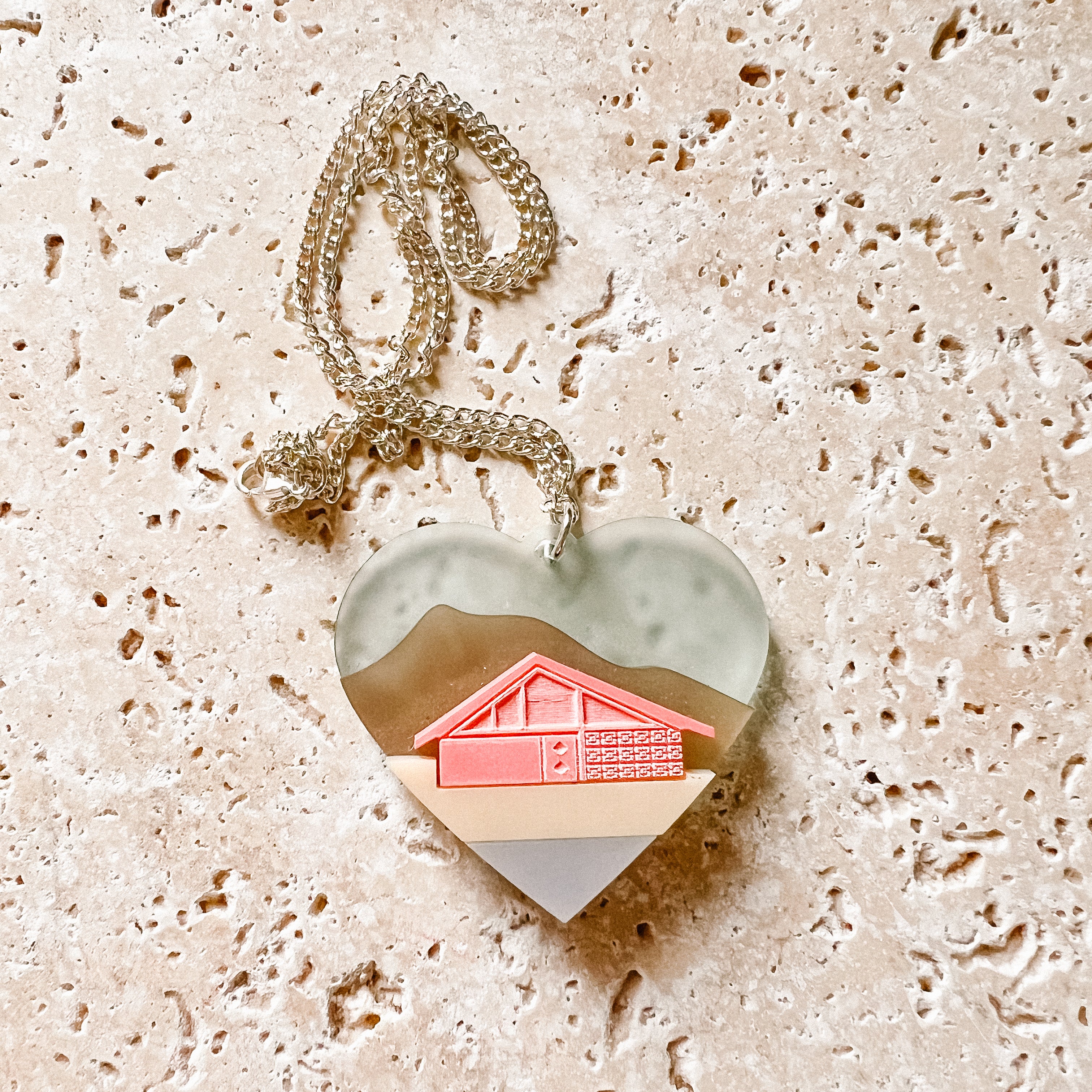 laser cut heart necklace with palm springs inspired design